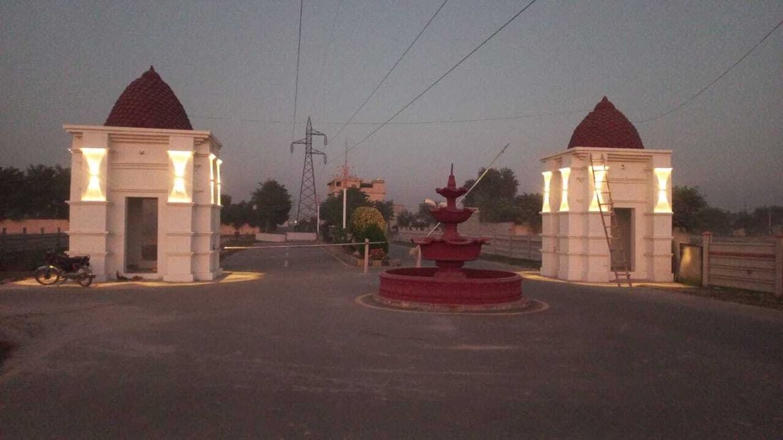 Illuminated entrance gate and fountain at Japan Town, Mamu Kanjan