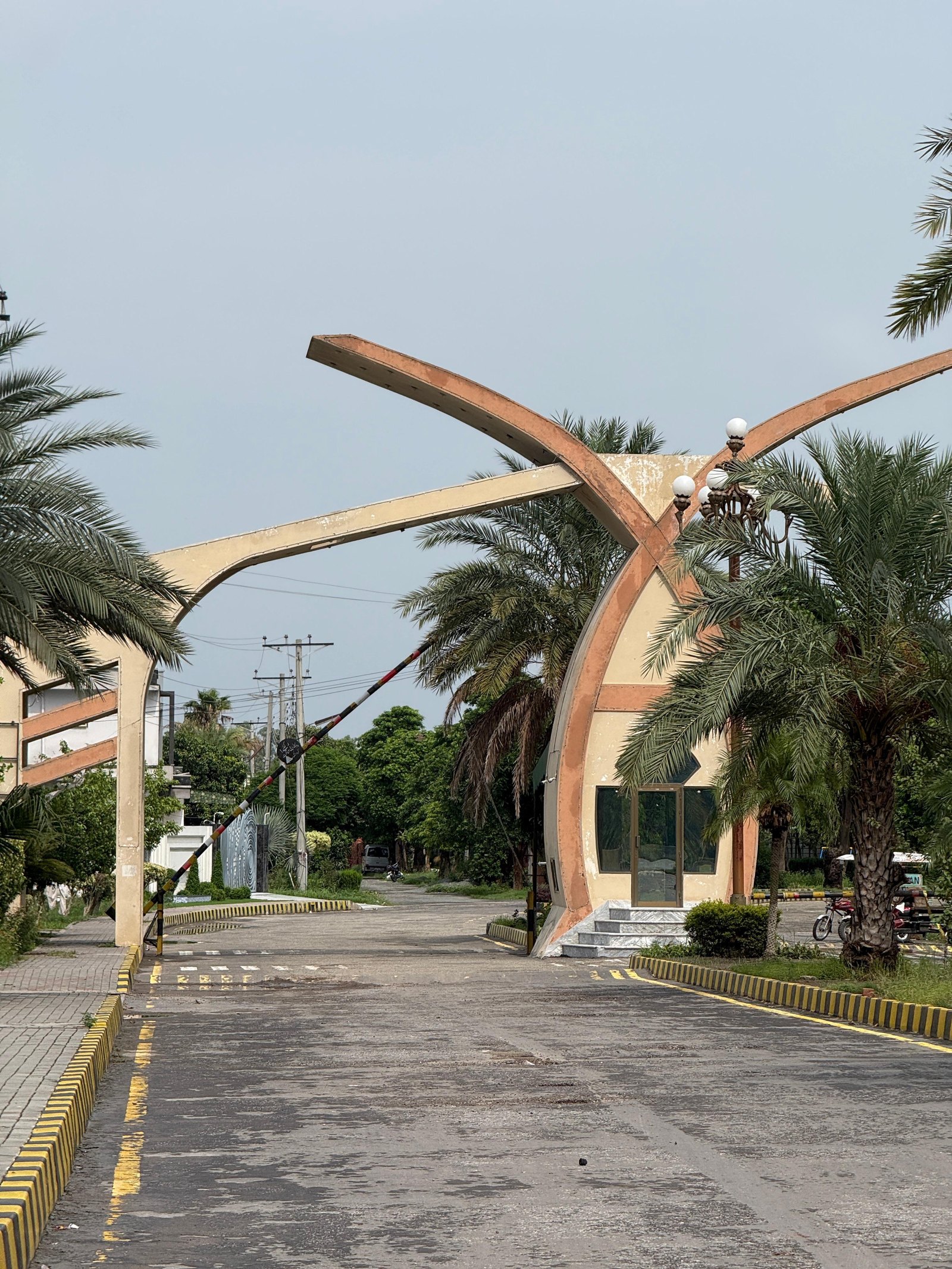 Palm-lined boulevard at Sharjah City Housing Scheme, Gujranwala